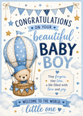 A baby shower congratulations card featuring a teddy bear in a hot air balloon basket, with blue and white text reading 'Congratulations on your beautiful baby boy' and 'Welcome to the world, little one'.